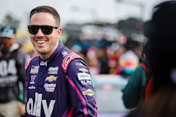 Alex Bowman, driver of Hendrick's #48 racecar smiles to fans at Daytona.