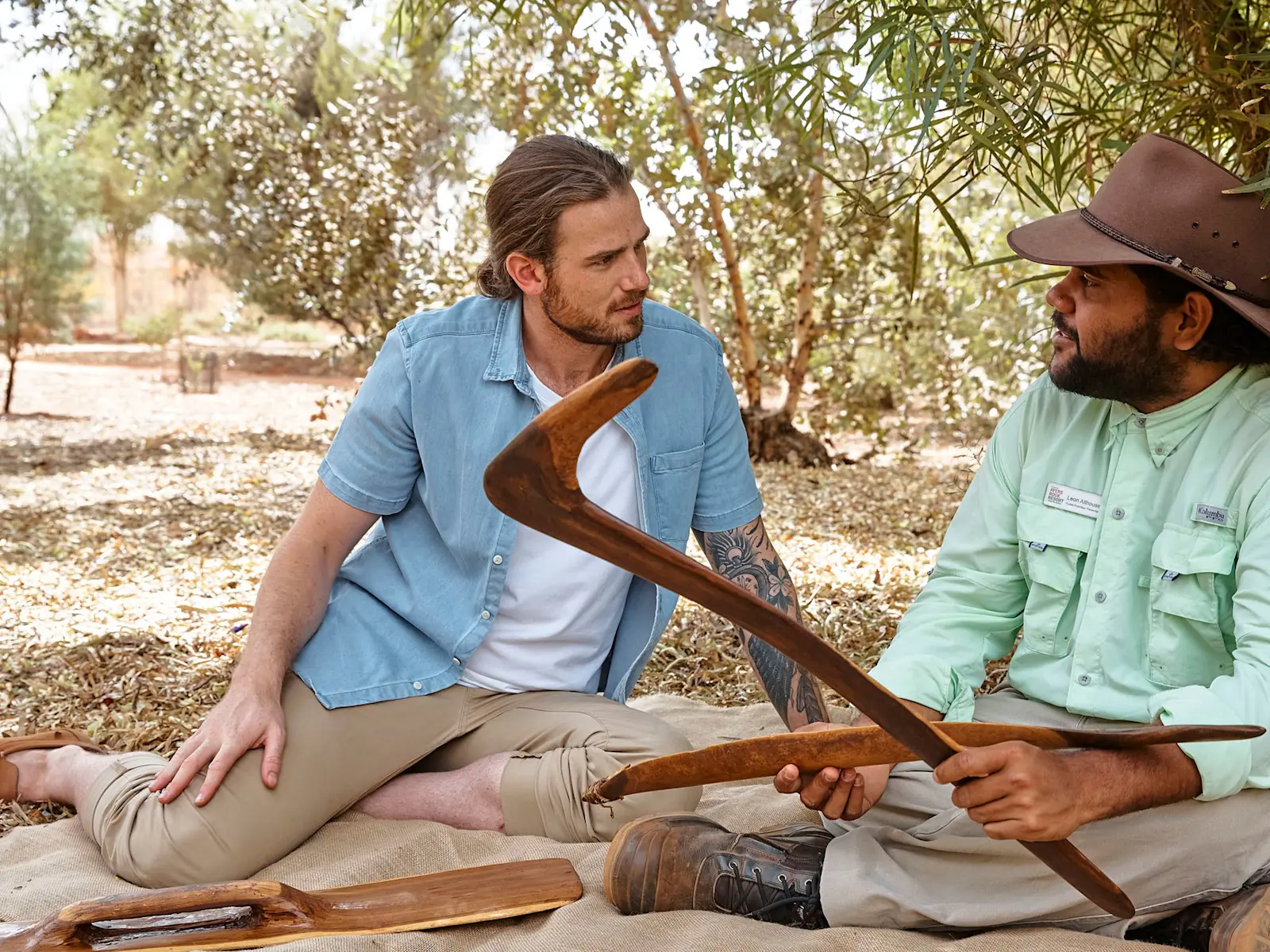 A Voyages Indigenous Tourism Australia guide sharing knowledge about the boomerang, NT © Voyages Indigenous Tourism Australia 