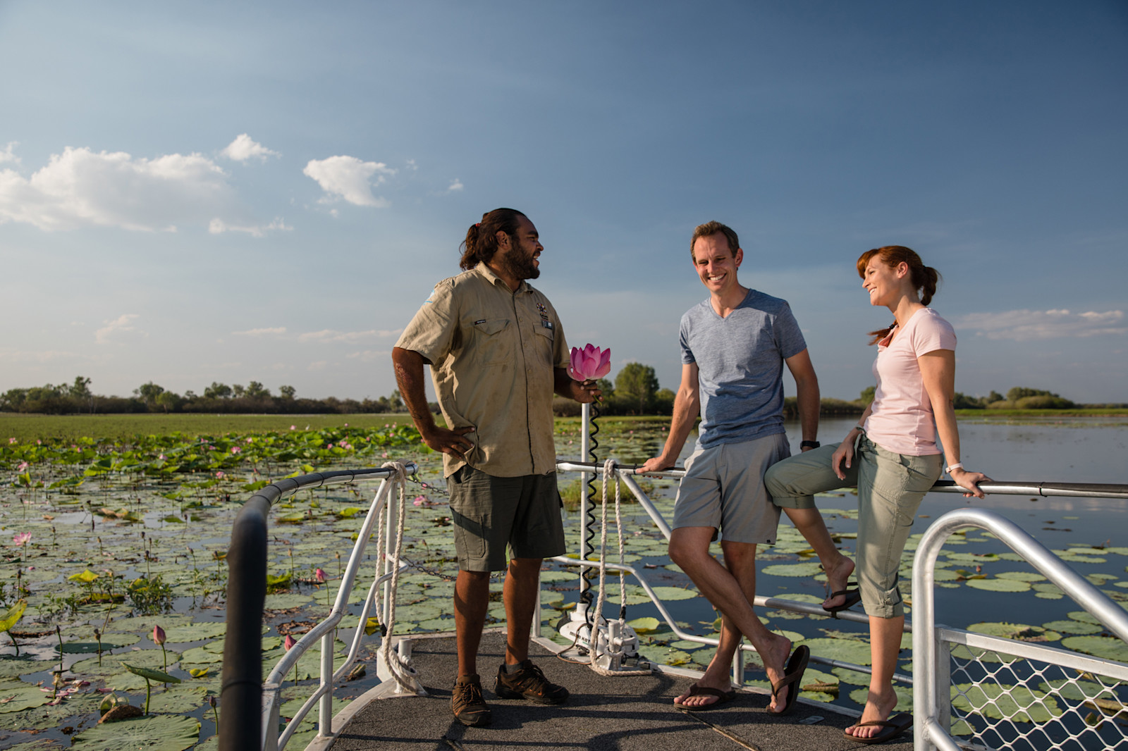 A Kakadu Tourism guide and guests on a wetland cruise, NT © Tourism Australia