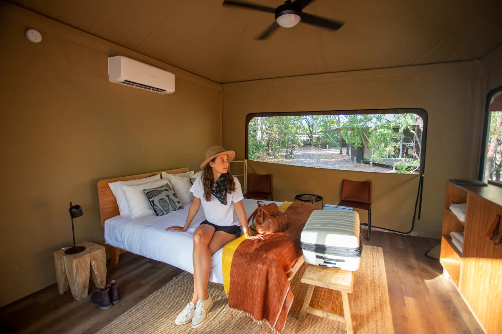 A woman inside the Cooinda Lodge accommodation, Kakadu, NT © Tourism Australia
