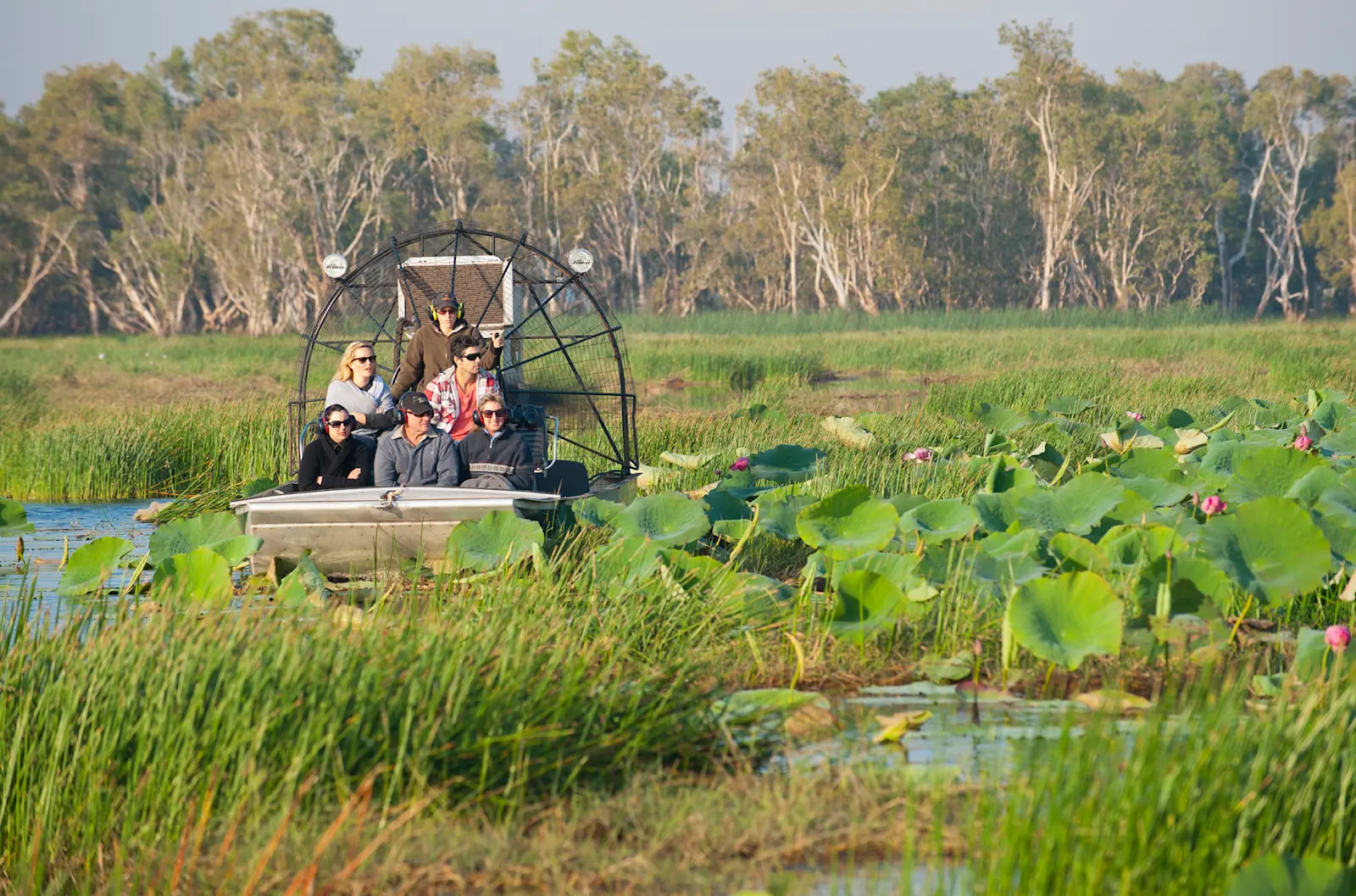 An airboat touring through the Bamurru floodplains on a Lords Kakadu & Arnhemland Safaris tour, NT © Lords Safaris  