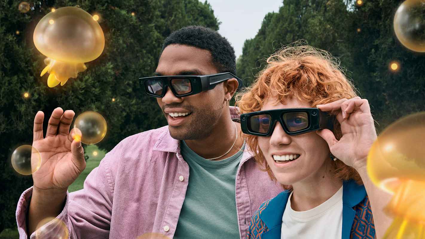 Two friends using Spectacles together.
